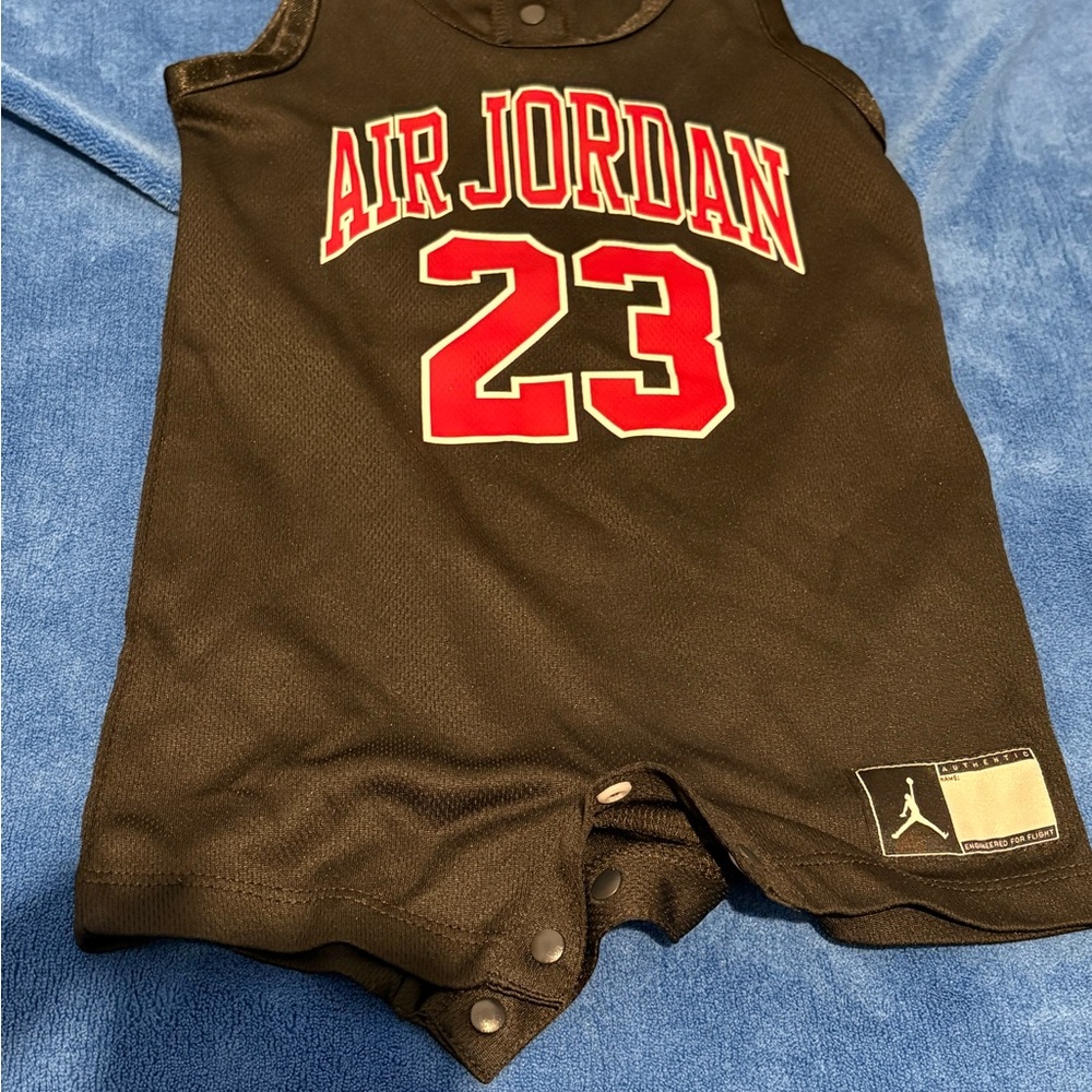 Jordan Black Baby Bodysuit with Red Jumpman Logo